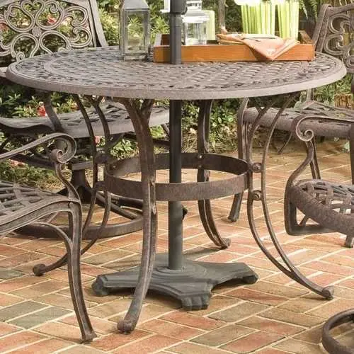Rust Brown Metal 42-Inch Round Outdoor Dining Table With Umbrella Cutout 1